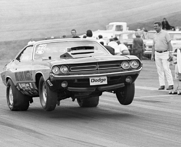 Period black-and-white photograph of the Motown Missile Challenger launching at the strip