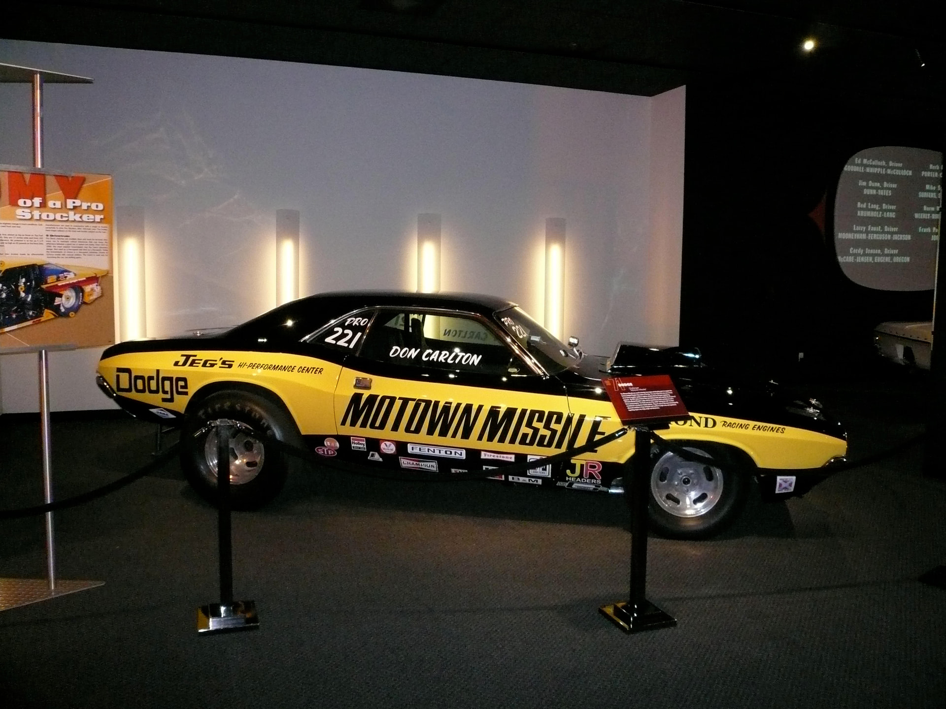Motown Missile Challenger shown from the side on indoor display