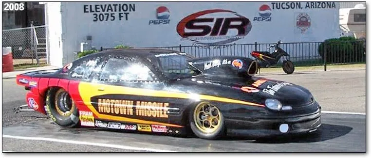 Later Pro Stock car carrying the Motown Missile name at a drag strip