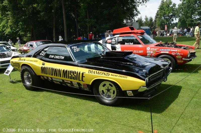Motown Missile Challenger displayed on a show field among competition cars